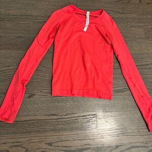 Long sleeved LuLulemon size 4.